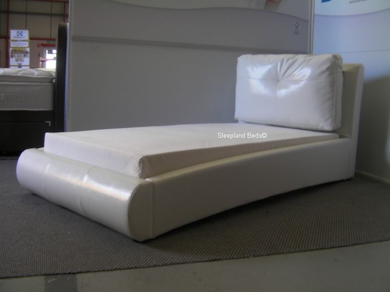 single white leather bed with mattress