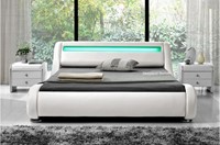 White leather beds with coloured lights in headboard
